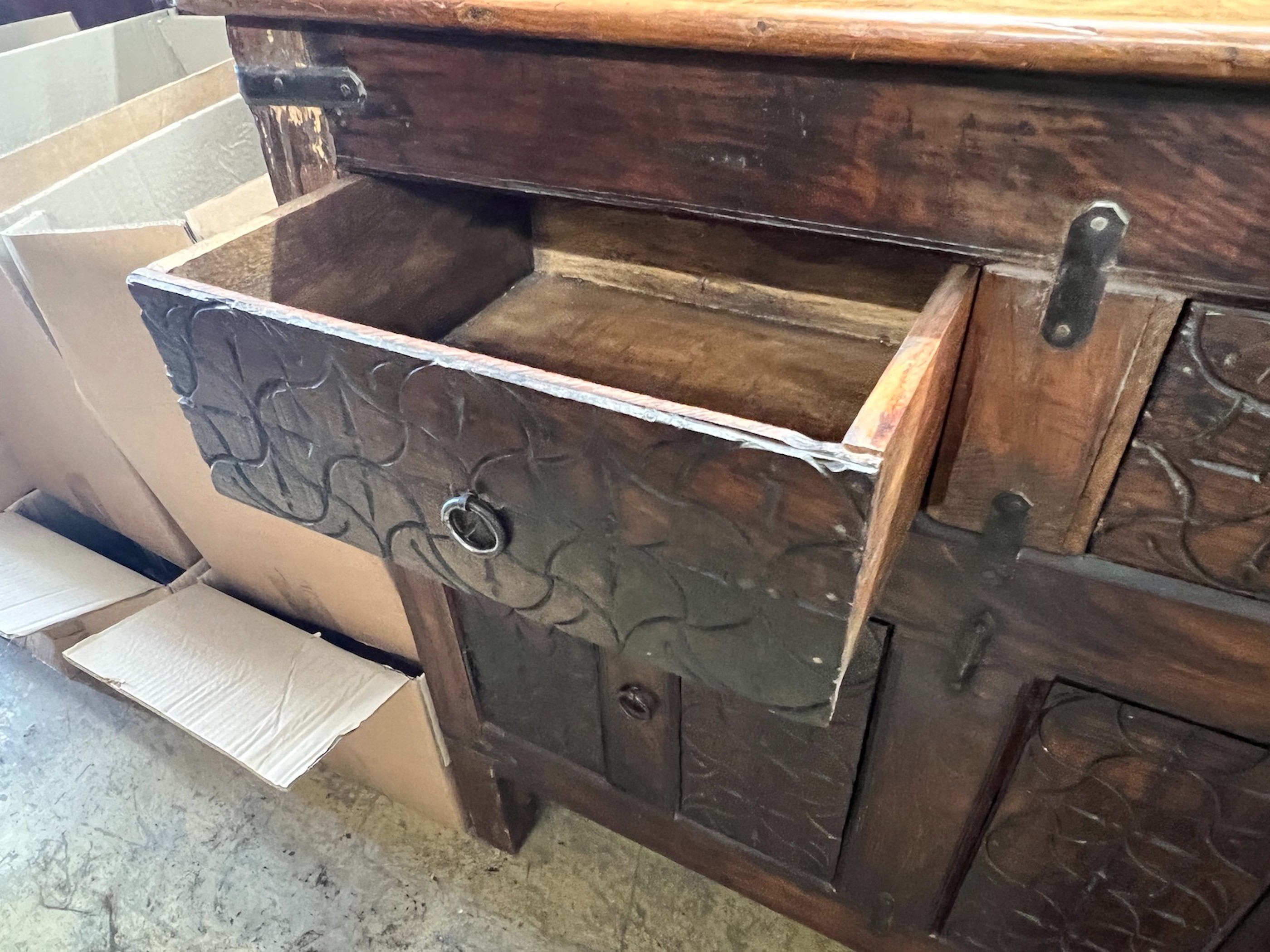 An Indian carved hardwood side cabinet, width 97cm, depth 41cm, height 93cm